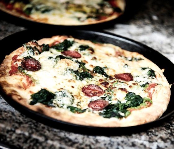 Heerlijke pizza bij Pizzeria La Quercia, © Familie Trovato Heerlijke pizza bij Pizzeria La Quercia, © Familie Trovato