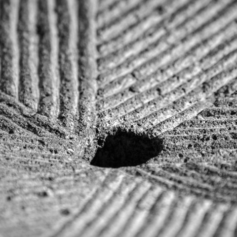 Bildauschnitt eines Mühlsteins